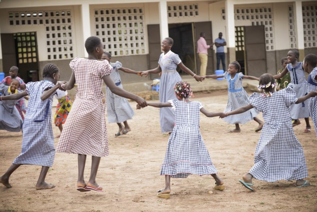 girls play at school, playground. Coalition for good schools